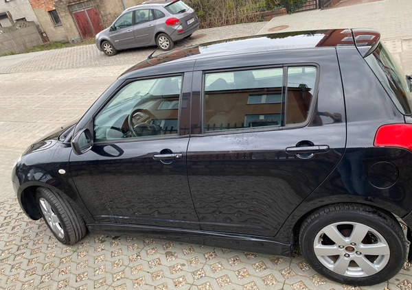 Suzuki Swift cena 16500 przebieg: 142000, rok produkcji 2010 z Wejherowo małe 301